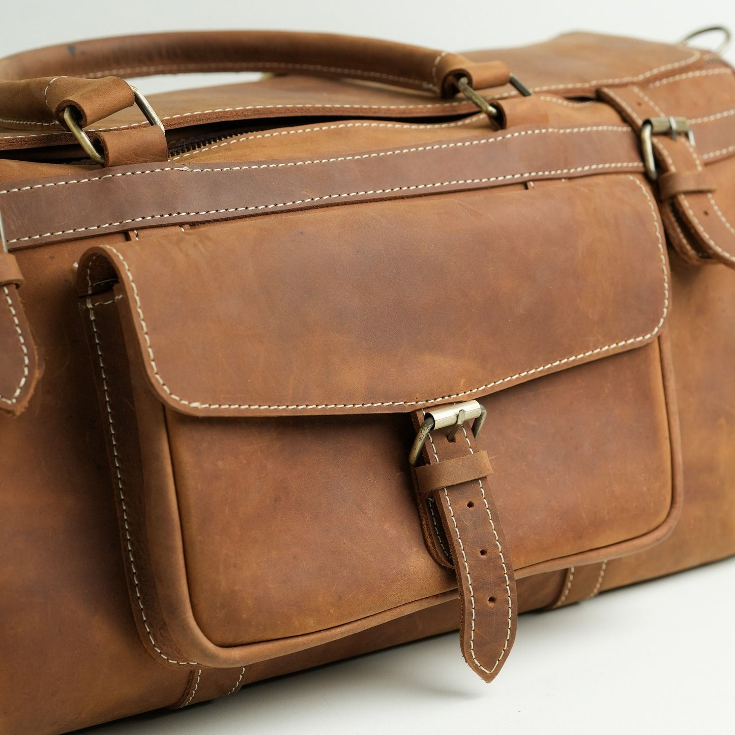 Leather duffel bag.