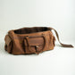 Leather duffel bag.
