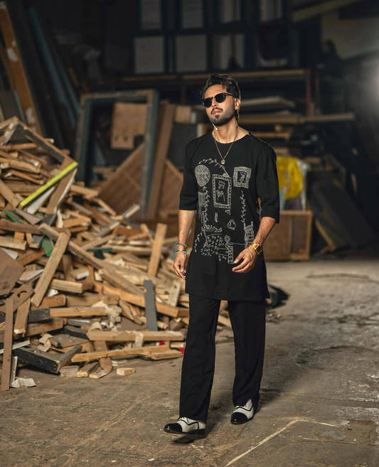 Fahad Mustafa wearing Snug luxe loose fit black kurta trouser for men premium Pakistani ethnic wear