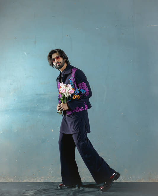 Snug's Dark Purple Cross Stitched Outfit.