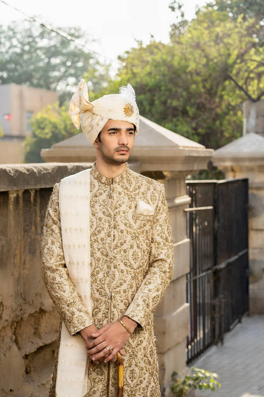 Imperial Splendor: Snug's Golden Hand Embroidered Sherwani Masterpiece - Snug
