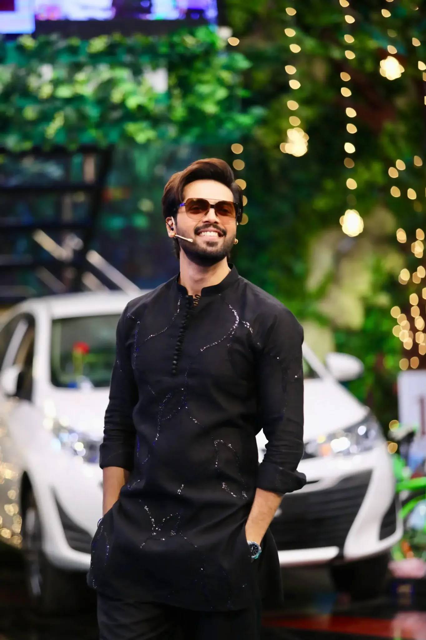 Fahad Mustafa wearing Snug black sequin kurta trouser set for men premium Pakistani festive wear