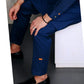Blue Zipper with Snug Badge. - Snug