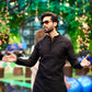 Fahad Mustafa wearing Snug black sequin kurta trouser set for men premium Pakistani festive wear