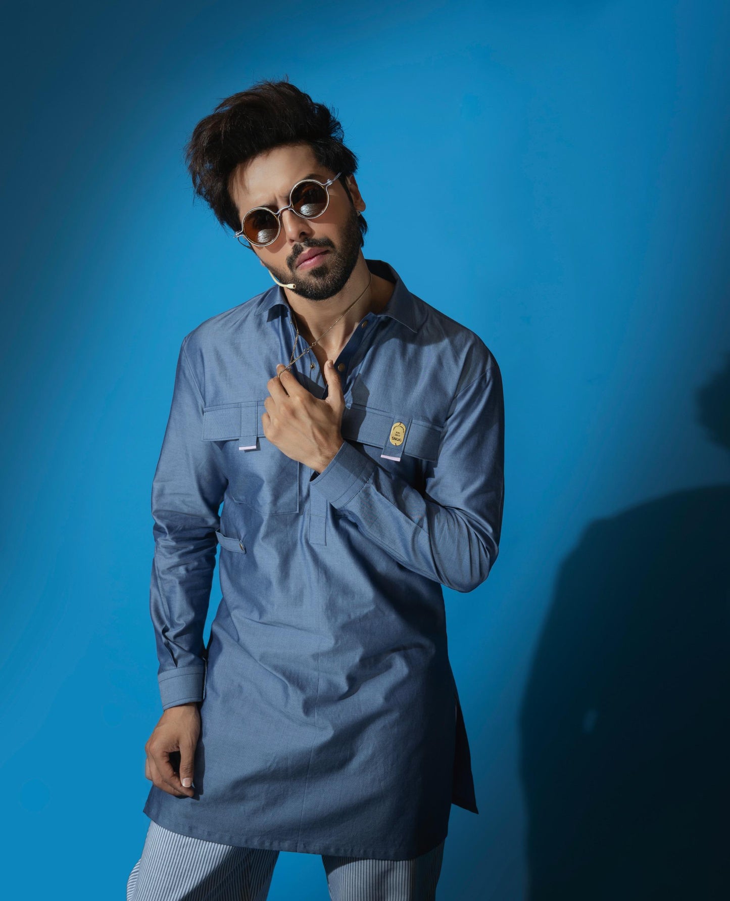 Fahad Mustafa's Trend: Denim Kurta & Striped Trousers!