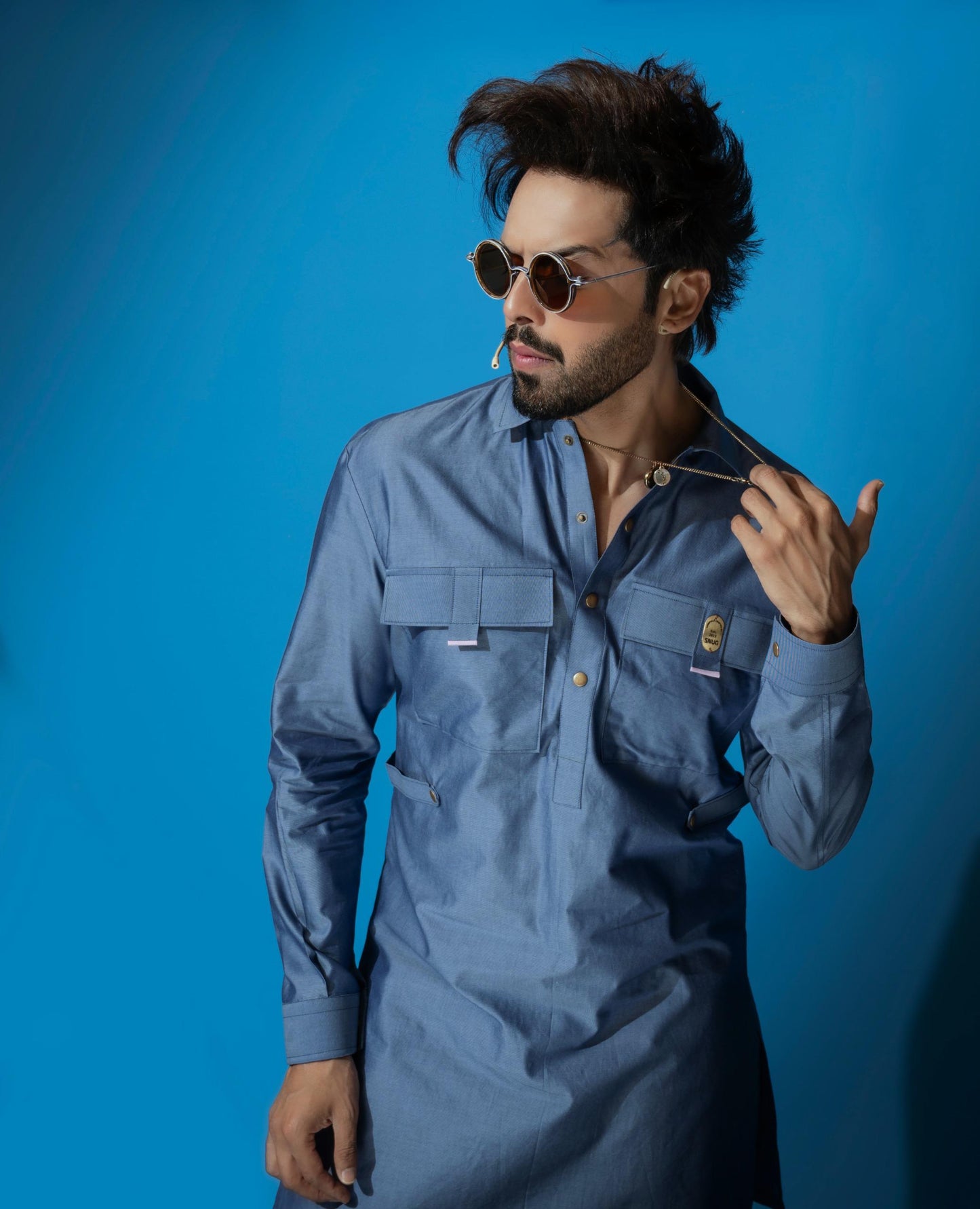 Fahad Mustafa's Trend: Denim Kurta & Striped Trousers!