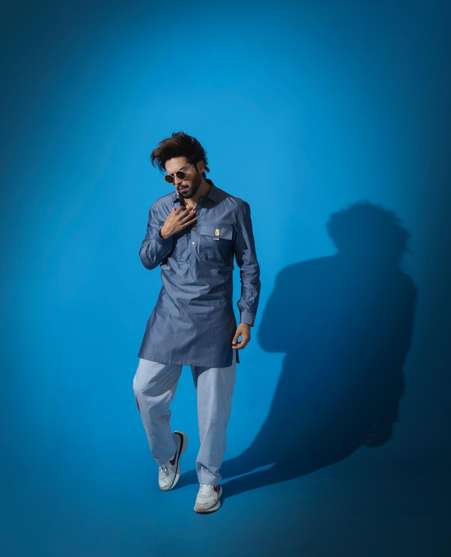 Fahad Mustafa's Trend: Denim Kurta & Striped Trousers!