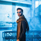 Fahad Mustafa wearing Snug black farshi outfit for men with embroidered shawl premium ethnic wear