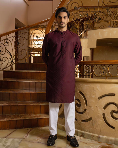 Maroon Self Embroidered Kurta Trouser.