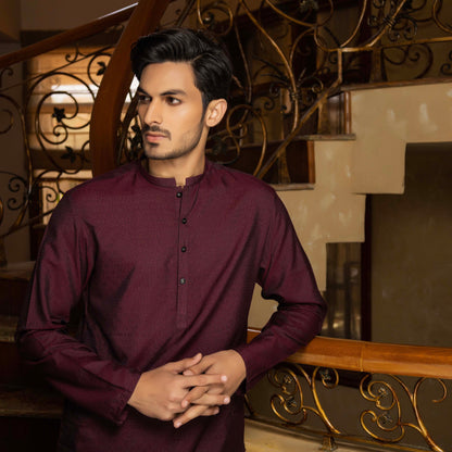 Maroon Self Embroidered Kurta Trouser.