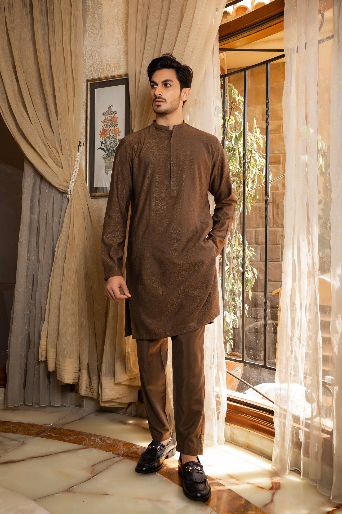 Brown Self Embroidered Kurta Trouser.