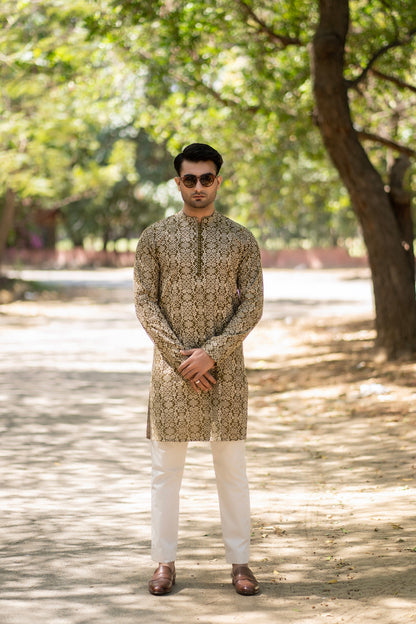 Needlework Marvels: Snug's Exclusive Embroidered Kurta Trouser Series.