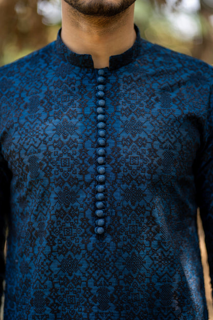 Needlework Marvels: Snug's Exclusive Embroidered Kurta Trouser Series.