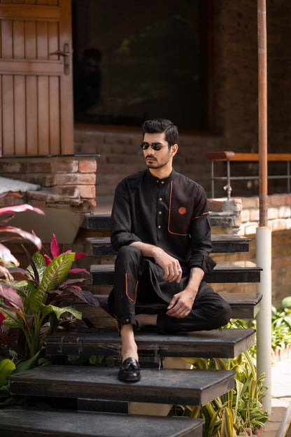 Rustic Elegance: Fahad Mustafa Black Linen Kurta, Trouser & Waistcoat Ensemble.